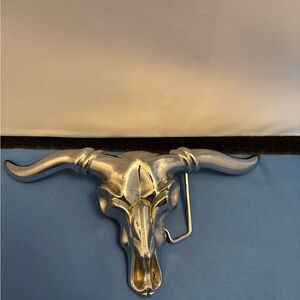 Vintage solid brass belt buckle featuring a longhorn bull skull design